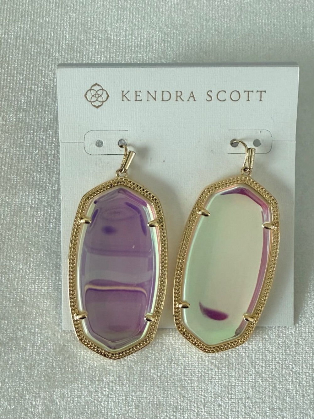 Kendra Scott —Elle gold drop earrings in dichroic glass.